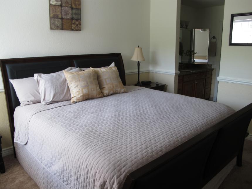 Master bedroom with king size bed.